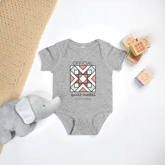 Official Quilt Model Baby onesie