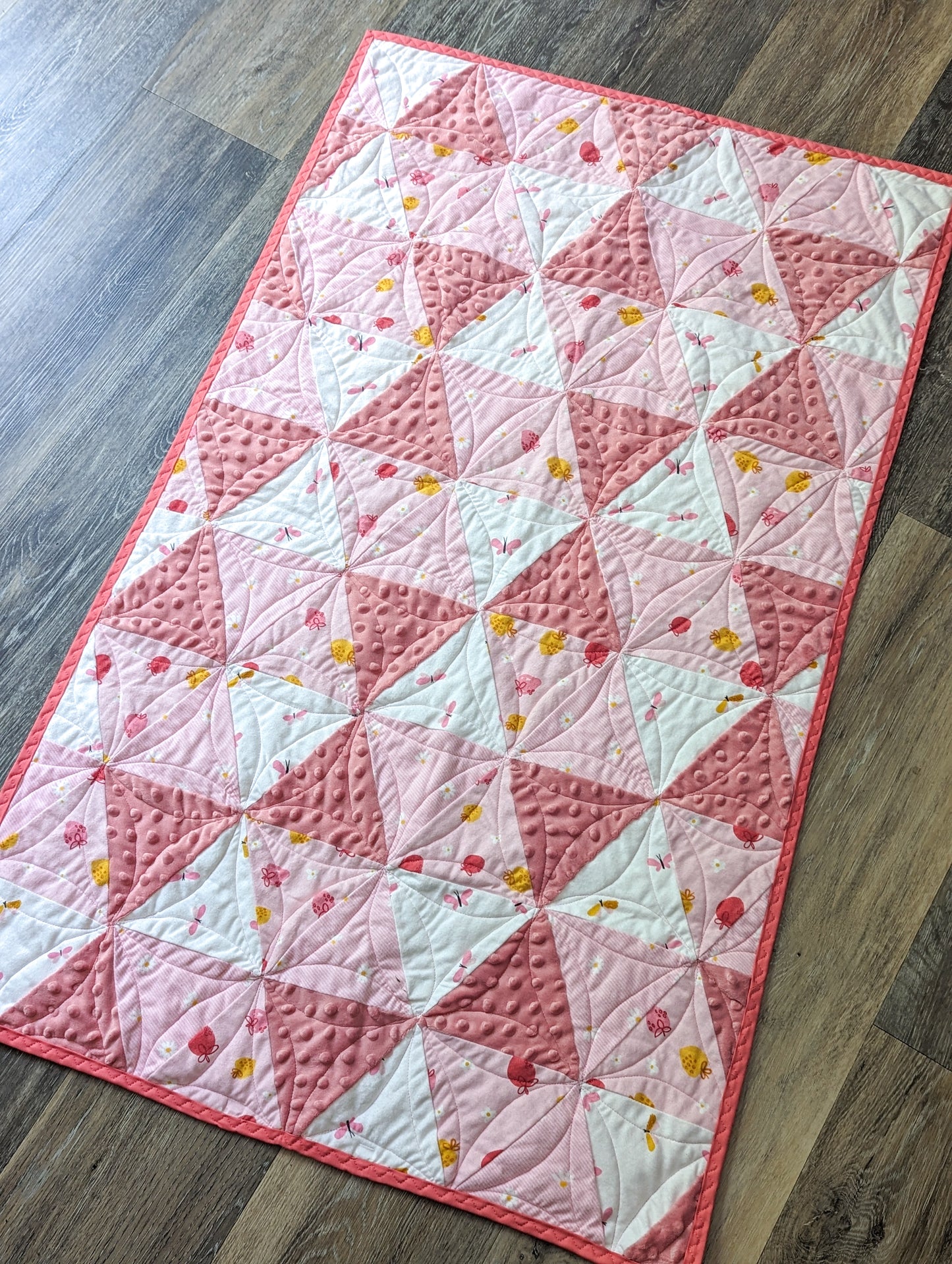 Strawberries and cream machine quilted crib quilt