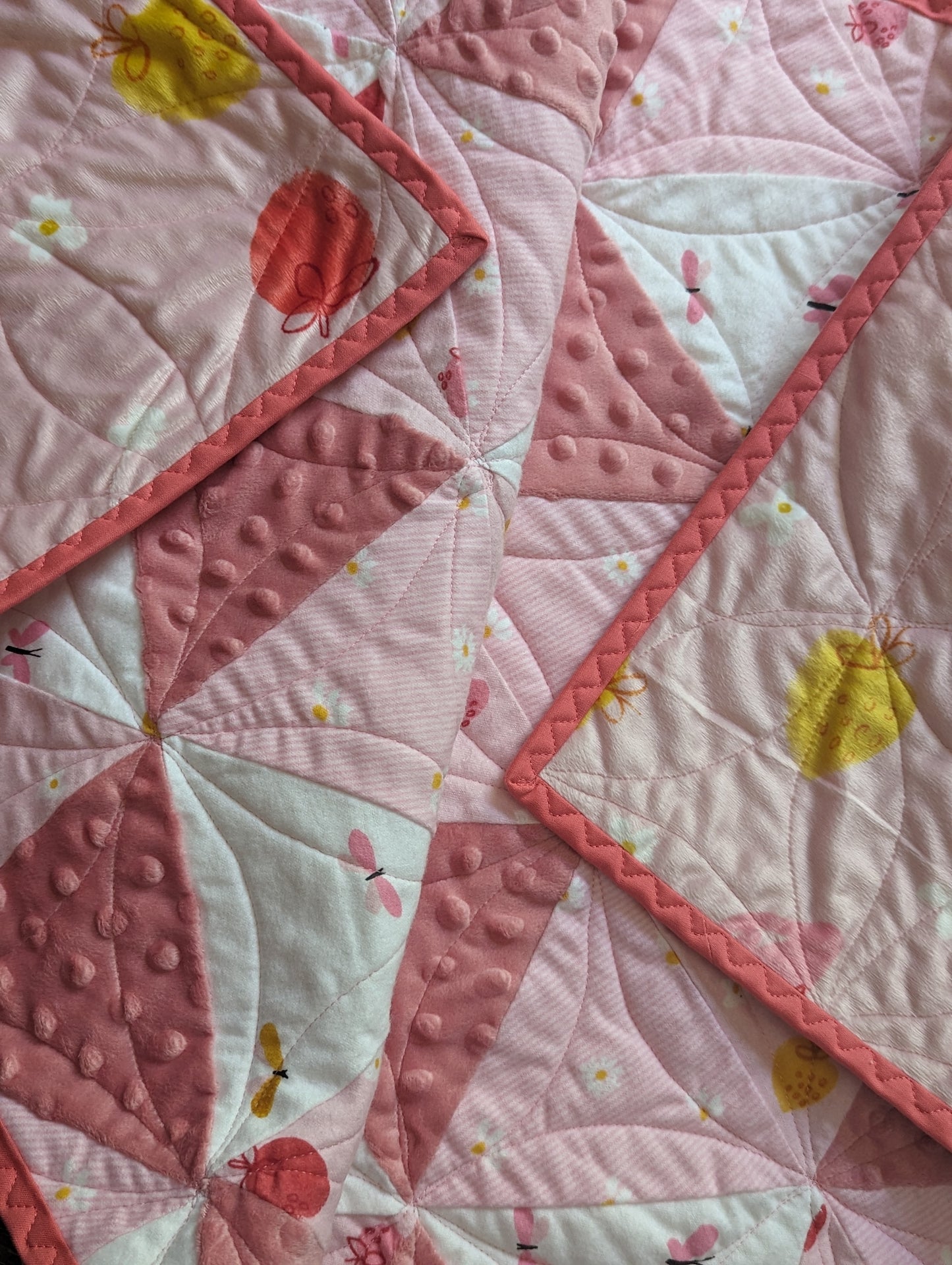 Strawberries and cream machine quilted crib quilt