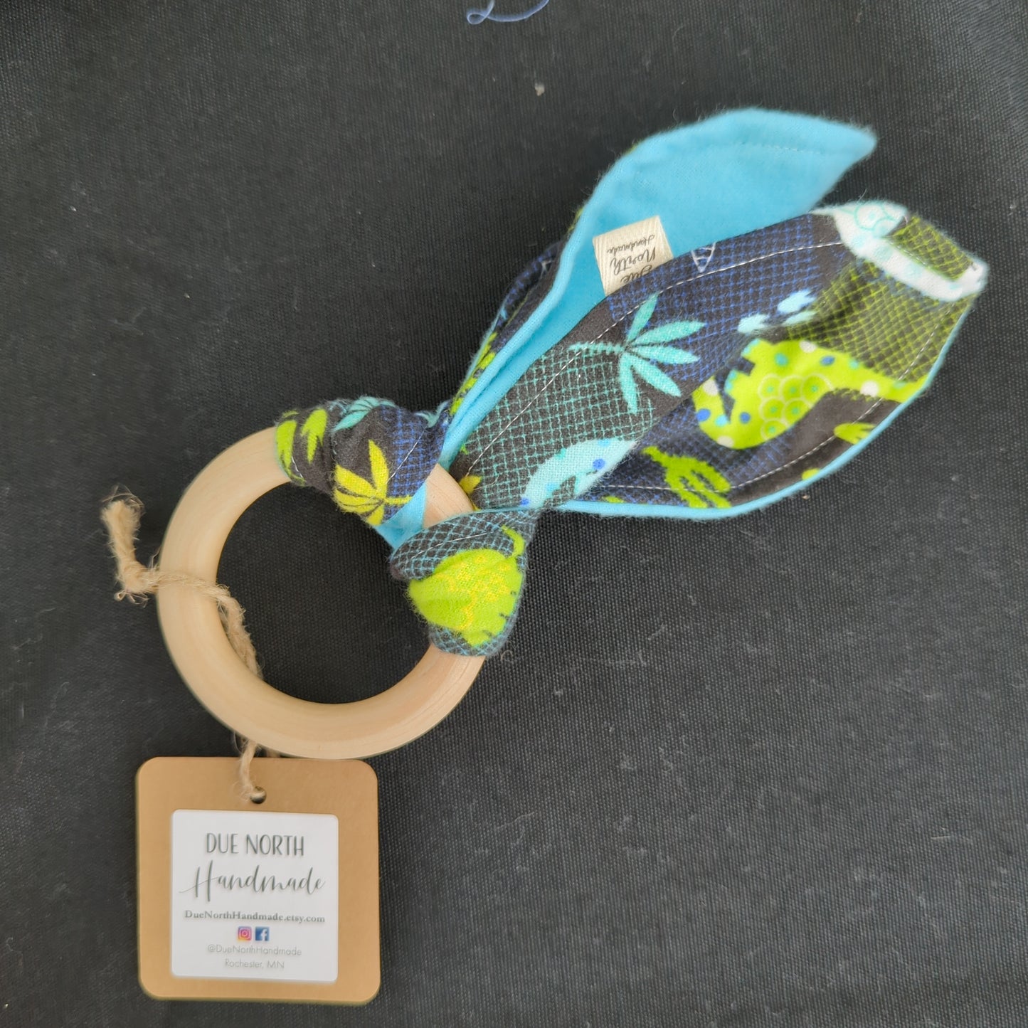 Crinkle Ears teething toy with natural wooden ring